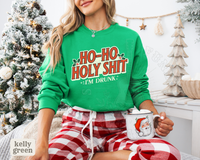 Thumbnail for A woman wearing a green sweatshirt with the text 