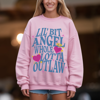 Thumbnail for A woman wearing a pink sweatshirt with a large text design on it.
