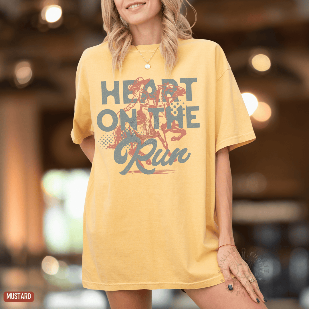 A Heart on the Run Cowgirl Tee - Sunlit Funlit | Graphic Tees for Country Concert Addicts