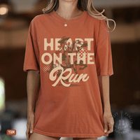 Thumbnail for A Heart on the Run Cowgirl Tee - Sunlit Funlit | Graphic Tees for Country Concert Addicts