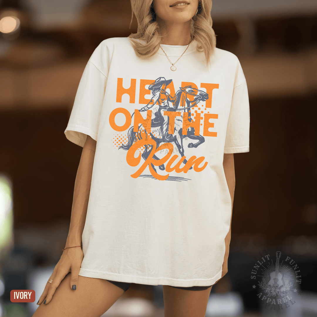A Heart on the Run Cowgirl Tee - Sunlit Funlit | Graphic Tees for Country Concert Addicts