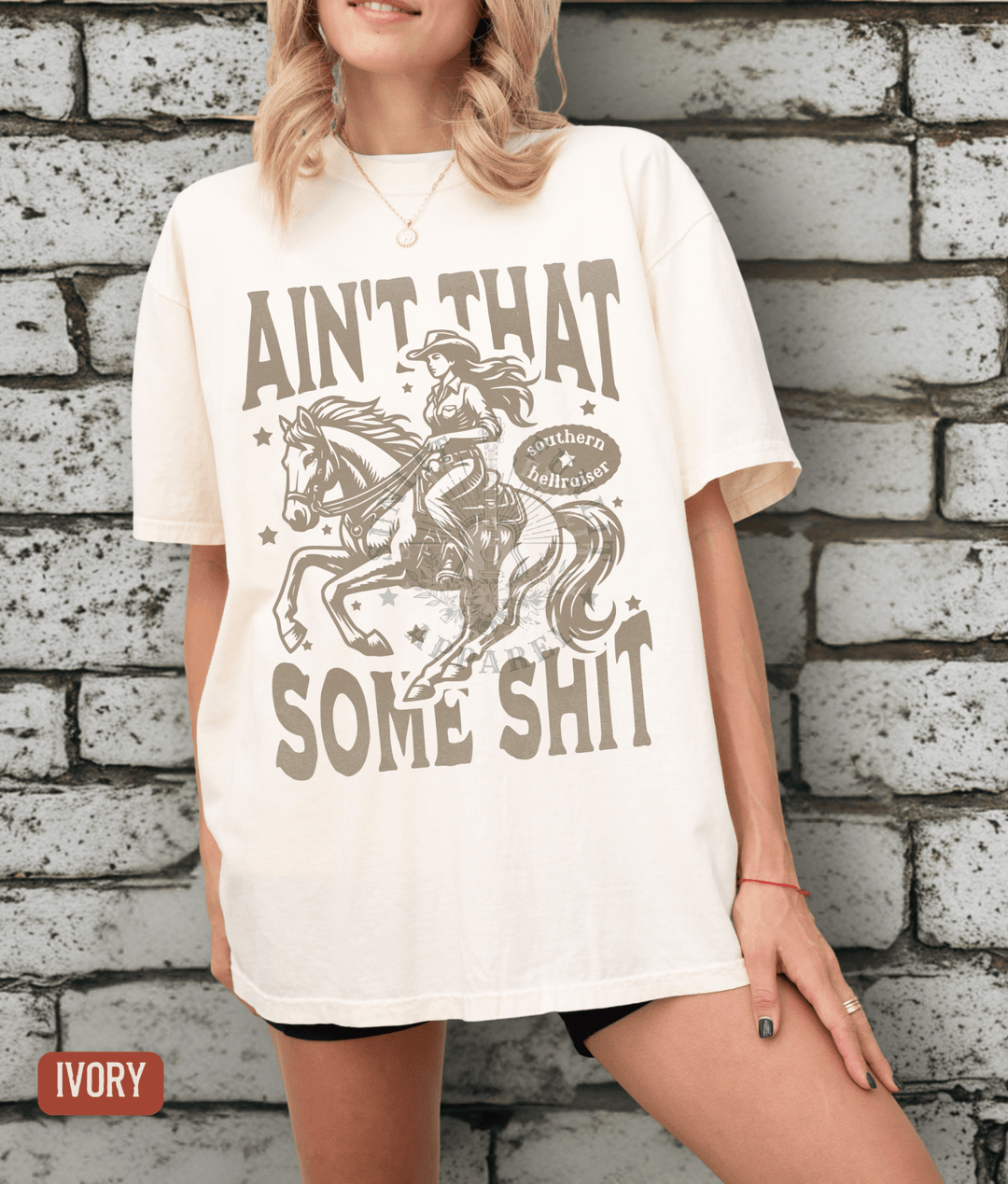 Ain't That Some Sh*t Southern Hellraiser Tee - Sunlit Funlit | Graphic Tees for Country Concert Addicts