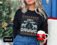 Thumbnail for A woman wearing a black sweater with a Christmas-themed design and holding a mug with a Santa Claus figure.