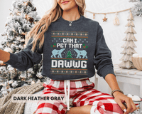 Thumbnail for A woman wearing a gray sweatshirt with a Christmas-themed design and text, sitting in front of a Christmas tree.