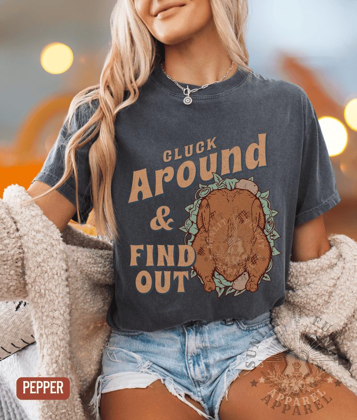 Cluck Around Find Out Funny Thanksgiving Tee - Sunlit Funlit | Graphic Tees for Country Concert Addicts