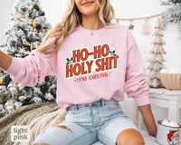 Thumbnail for A woman wearing a pink sweatshirt with the text 