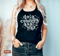 Thumbnail for Doin' Country Ass Shit Racerback Tank - Sunlit Funlit | Graphic Tees for Country Concert Addicts