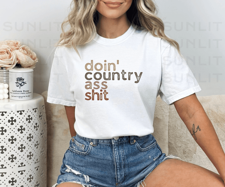 Doin' Country Ass Sh*t Stacked Tee - Sunlit Funlit | Graphic Tees for Country Concert Addicts