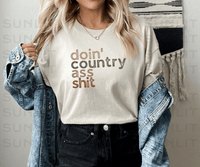 Thumbnail for Doin' Country Ass Sh*t Stacked Tee - Sunlit Funlit | Graphic Tees for Country Concert Addicts